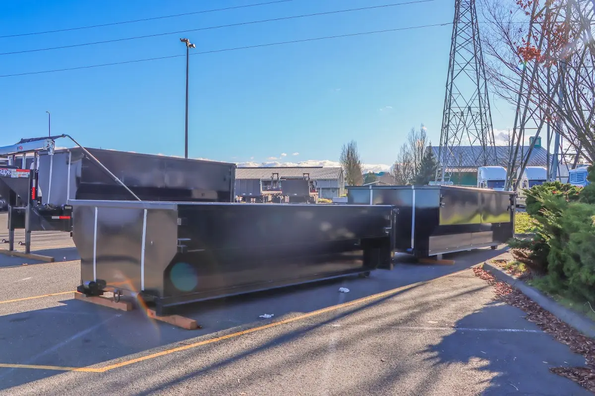 Roll-off dumpster ready for waste disposal at job site for Commercial Dumpster Rental in Valley Park